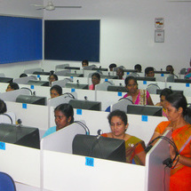 Sri Lanka teachers sitting behind computers learning the biosphere protocol.