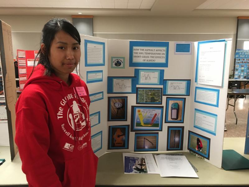 Student with poster board