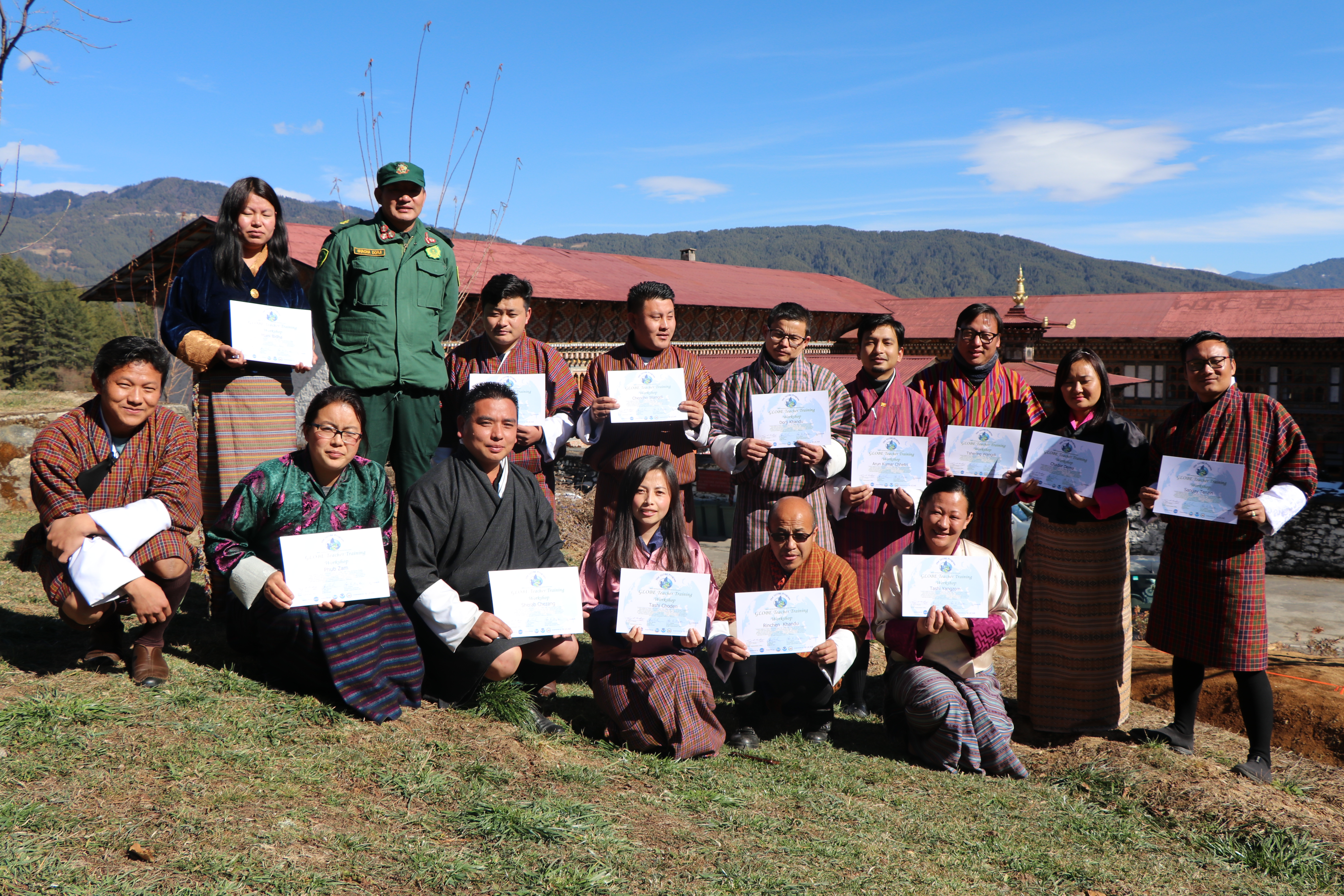 Director Shacha Dorji, Ugyen Wangchuck Institute for Conservation and Environment Research, presenting teachers with GLOBE teacher training certificate
