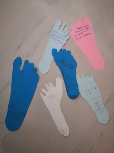 cutouts showing "carbon footprints"