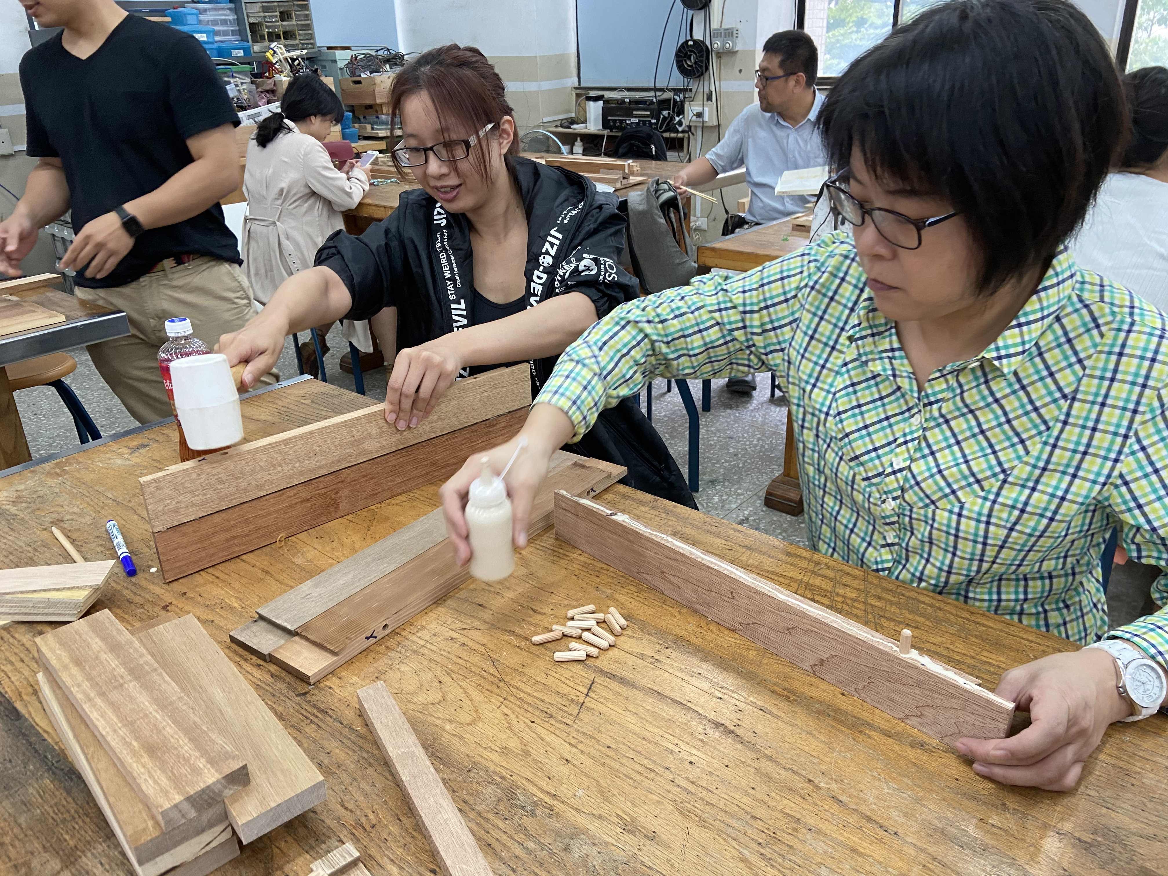 GLOBE Taiwan Partnership teachers building an instrument shelter