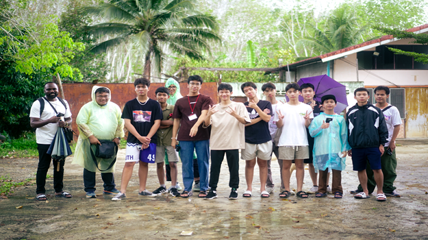 Students with their teachers in the Site area