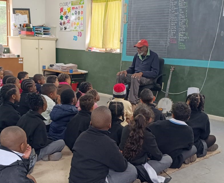 Dr. John Francis speaking to a class in South Africa