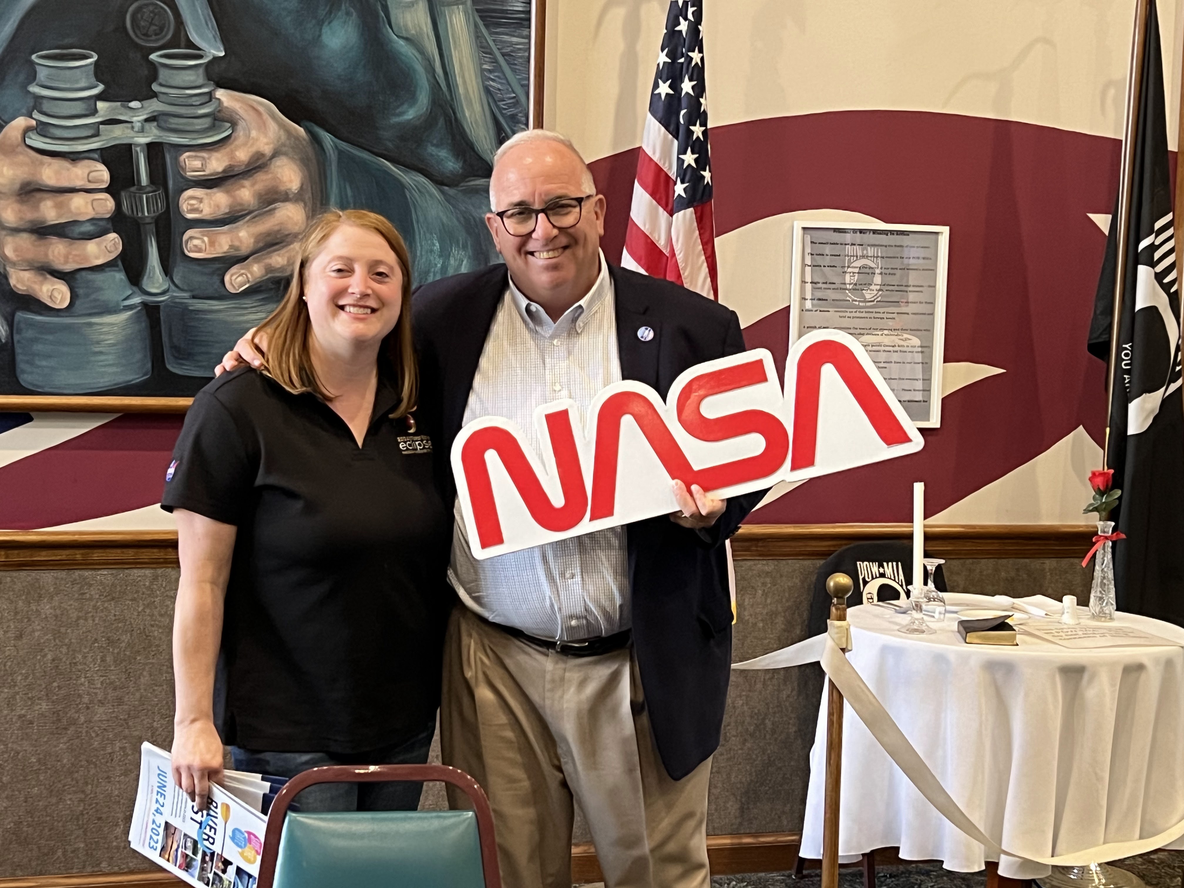 GLOBE Educator Julie Houck presents Defiance Mayor Mike McCann with a NASA logo