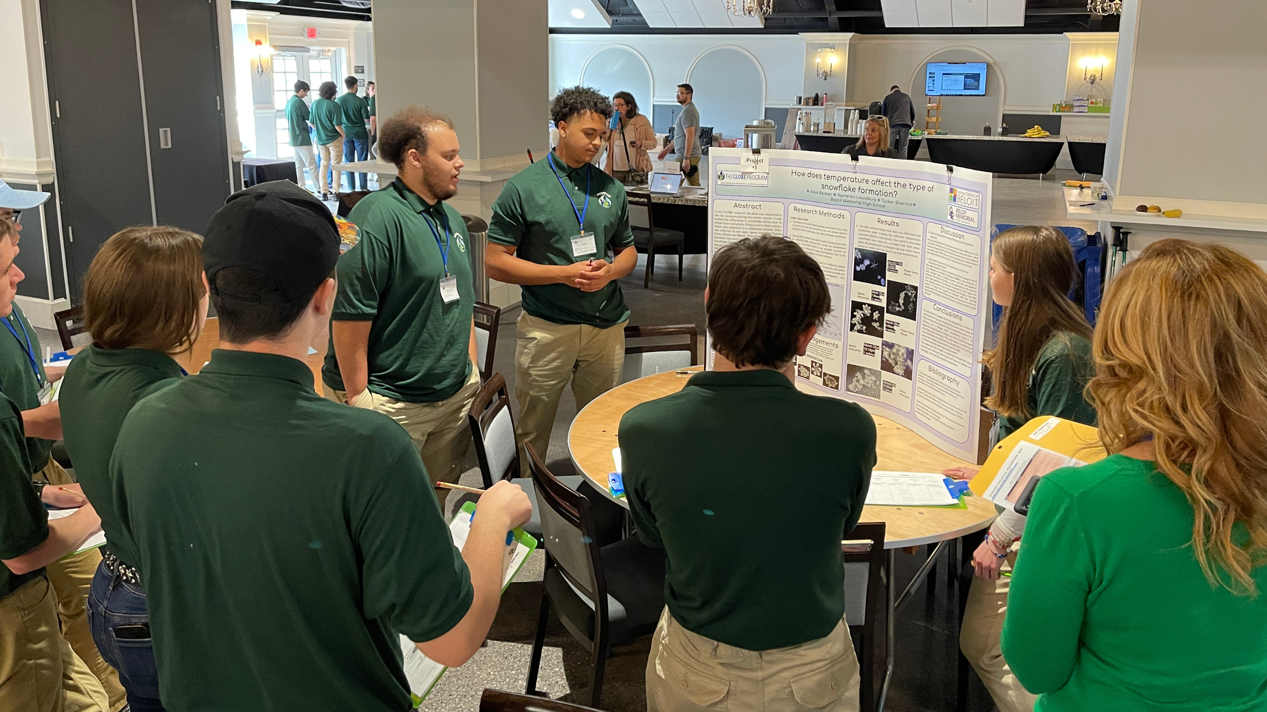 Students share their research with their peers during the poster session at the Midwest Student Research Symposium