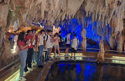 students in a cave