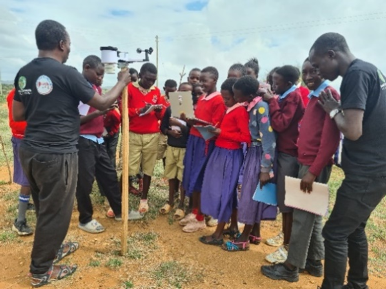 Students in Kenya conducting research with equipment funded by a 2024 YLACES grant