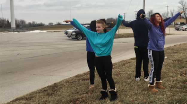 Students doing cloud observations