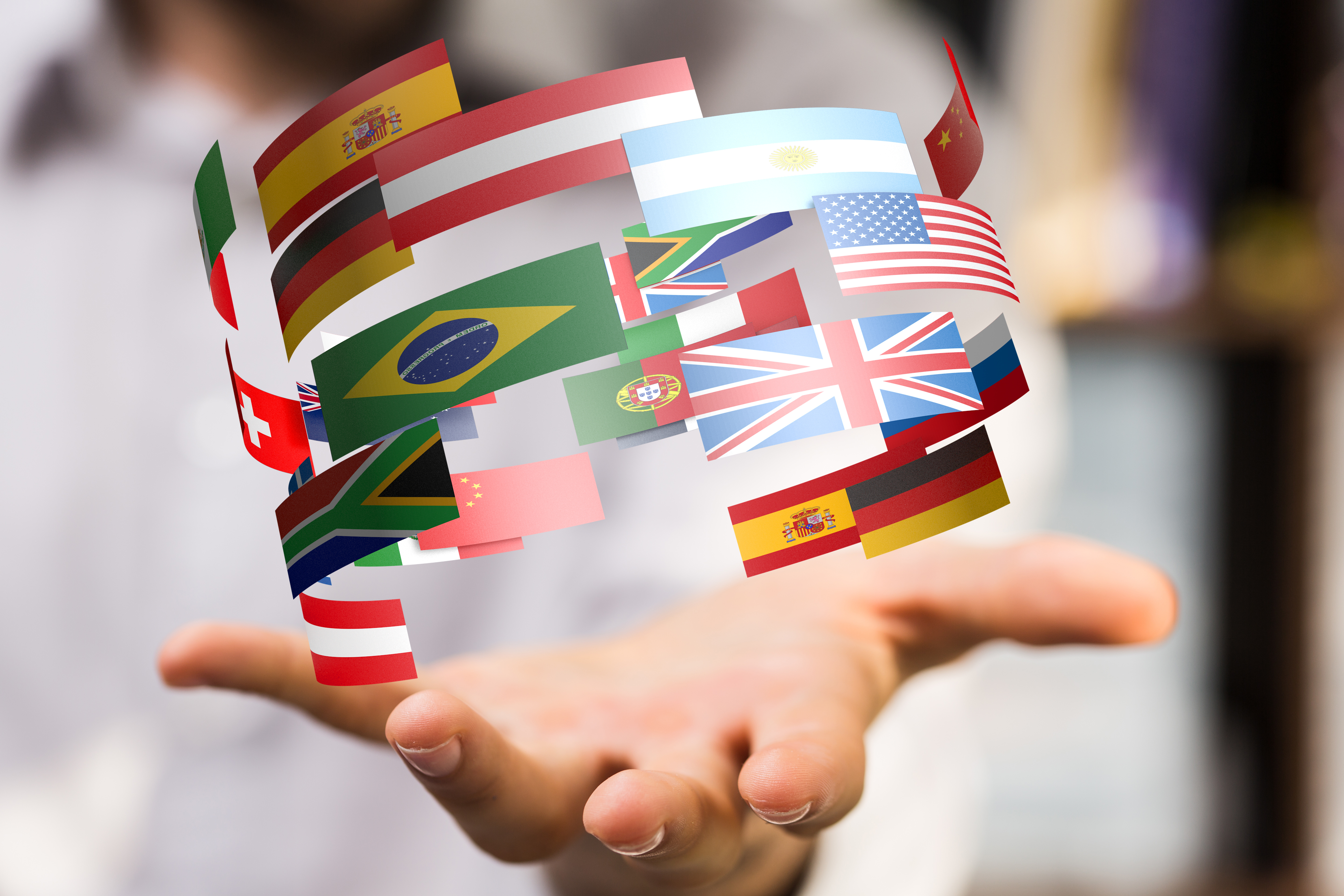 swirling flags above a hand