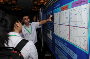 Photo of GLOBE students presenting a poster
